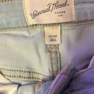 Universal Thread Blue Jeans with Contrast Stitching and Distressed Look